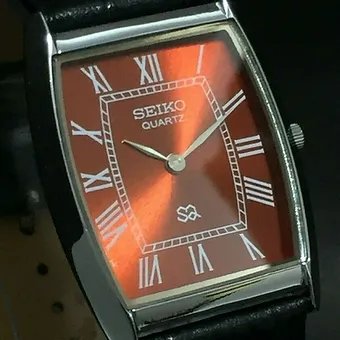 Seiko Slim Barrel Quartz Red Face Black Band Men's Wrist Watch C85