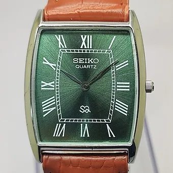 Seiko Slim Barrel Quartz Green Face Brown Band Men's Wrist Watch C88