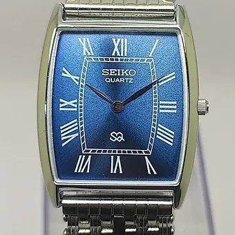 Seiko Slim Barrel Quartz Blue Face Looser Chain Not Adjustable Men's Wrist Watch C90