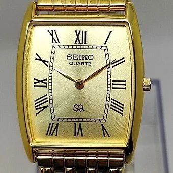 Seiko Slim Barrel Quartz Golden Face Looser Chain Not Adjustable Men's Wrist Watch C92